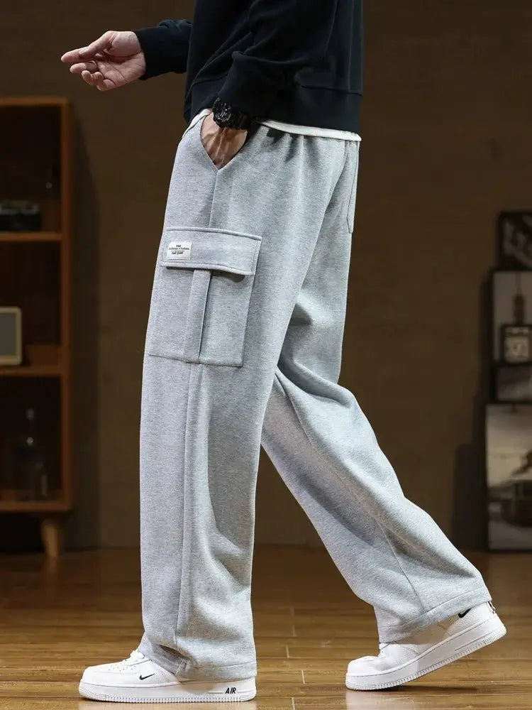 Men's gray cotton cargo sweatpants with multiple pockets and a drawstring waist, loose wide-leg fit, 8XL