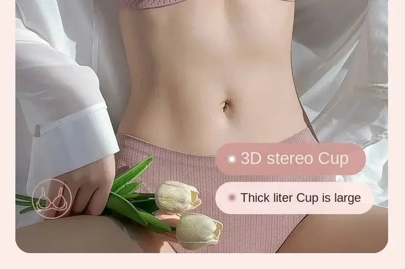 Pink push-up bra with thick 6cm padding and 3D stereo cups, paired with pink ribbed panties.