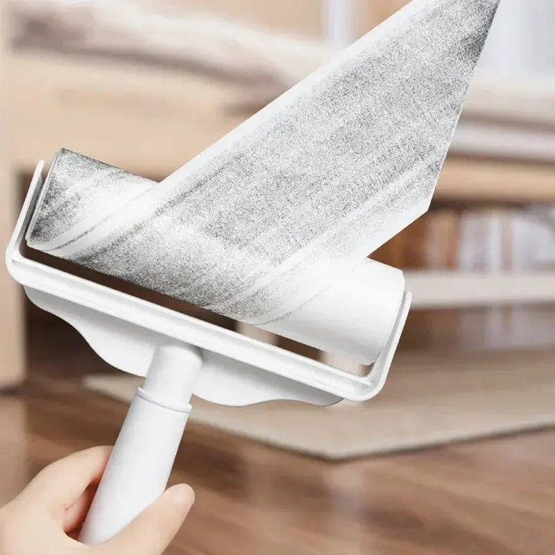 Lint roller refill tearable brush head by Simples Market, white plastic handle with gray adhesive sheet