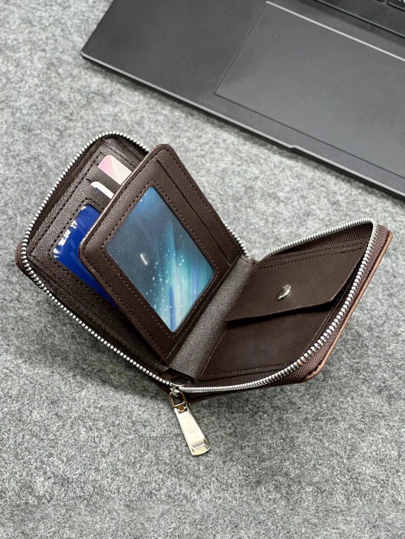 Zippered Slim PU Wallet by Simples Market, brown, open to reveal card slots and clear ID window.
