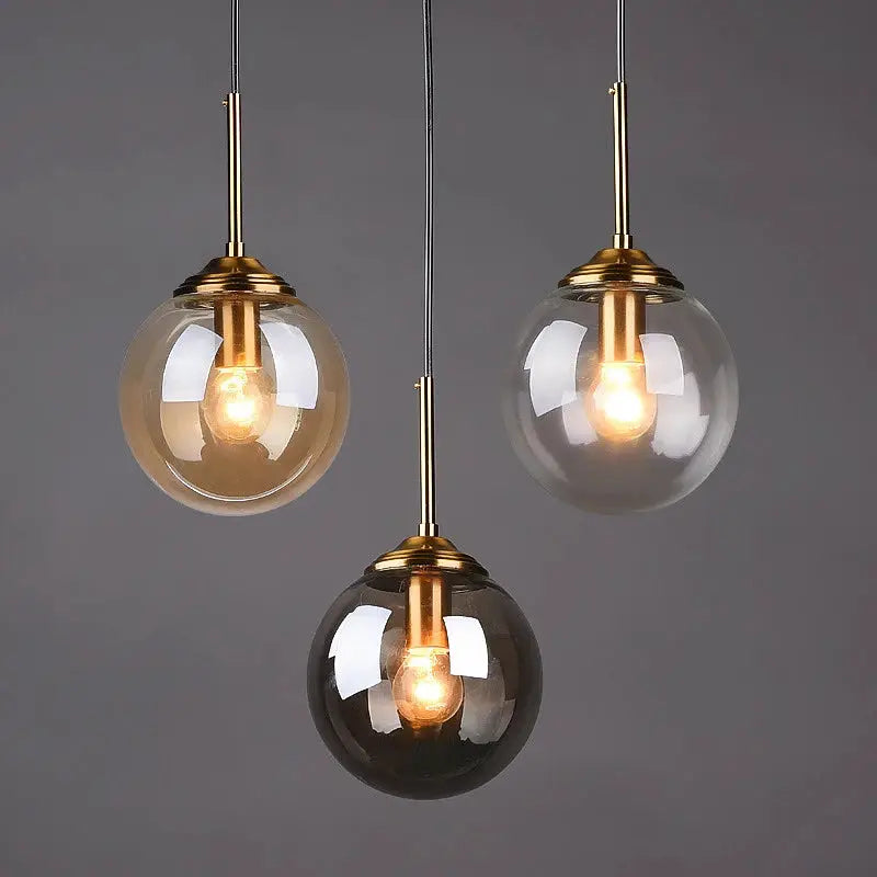 Simples Market modern luxury metal chandelier with 3 glass pendant lamps in amber, clear and gray with brass fittings