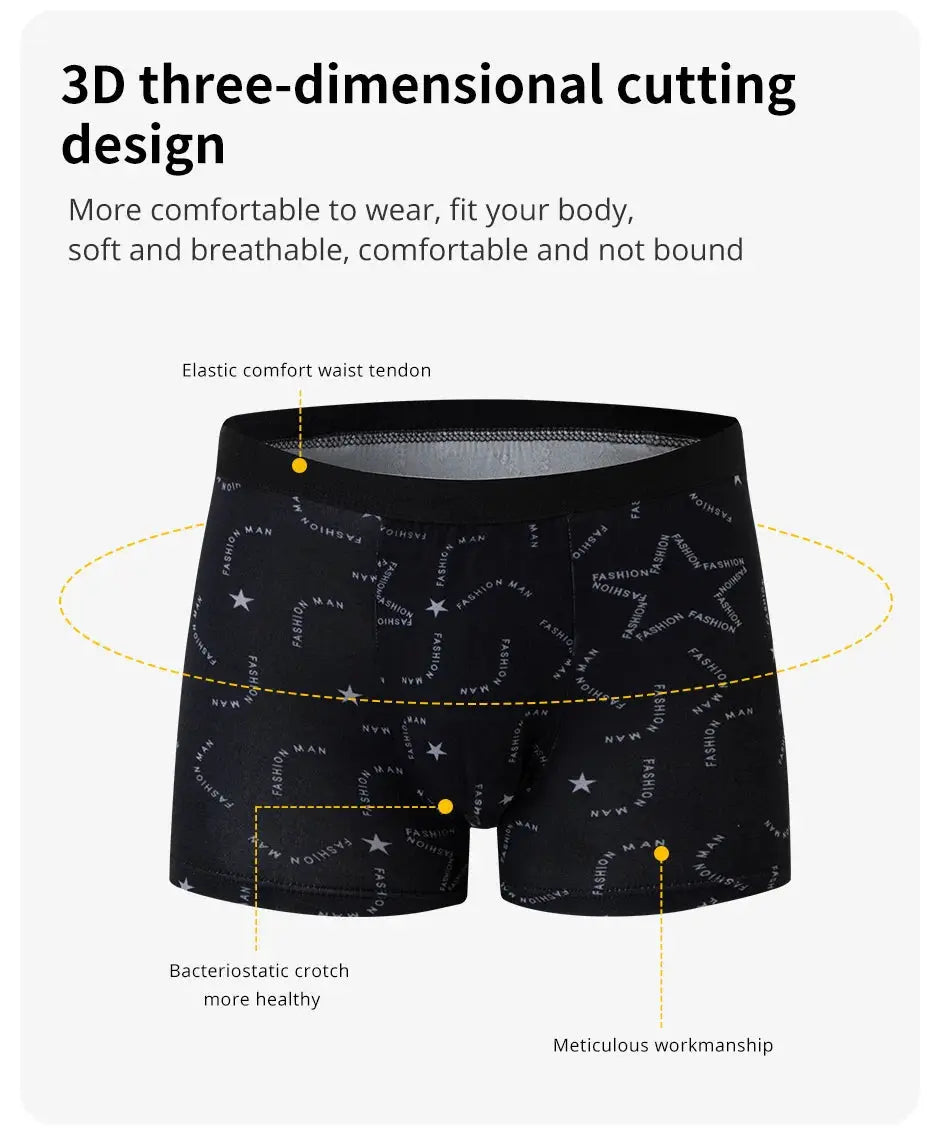 Men's black printed boxer trunks with elastic waistband and star/text pattern.