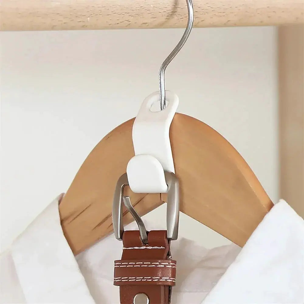 Simples Market mini wardrobe hanger connector, white plastic with metal hook, on wooden hanger.