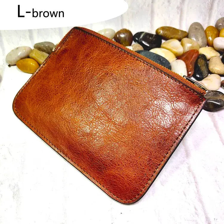 Mini zipper waist bag in brown leather; compact card/ID wallet with top zipper