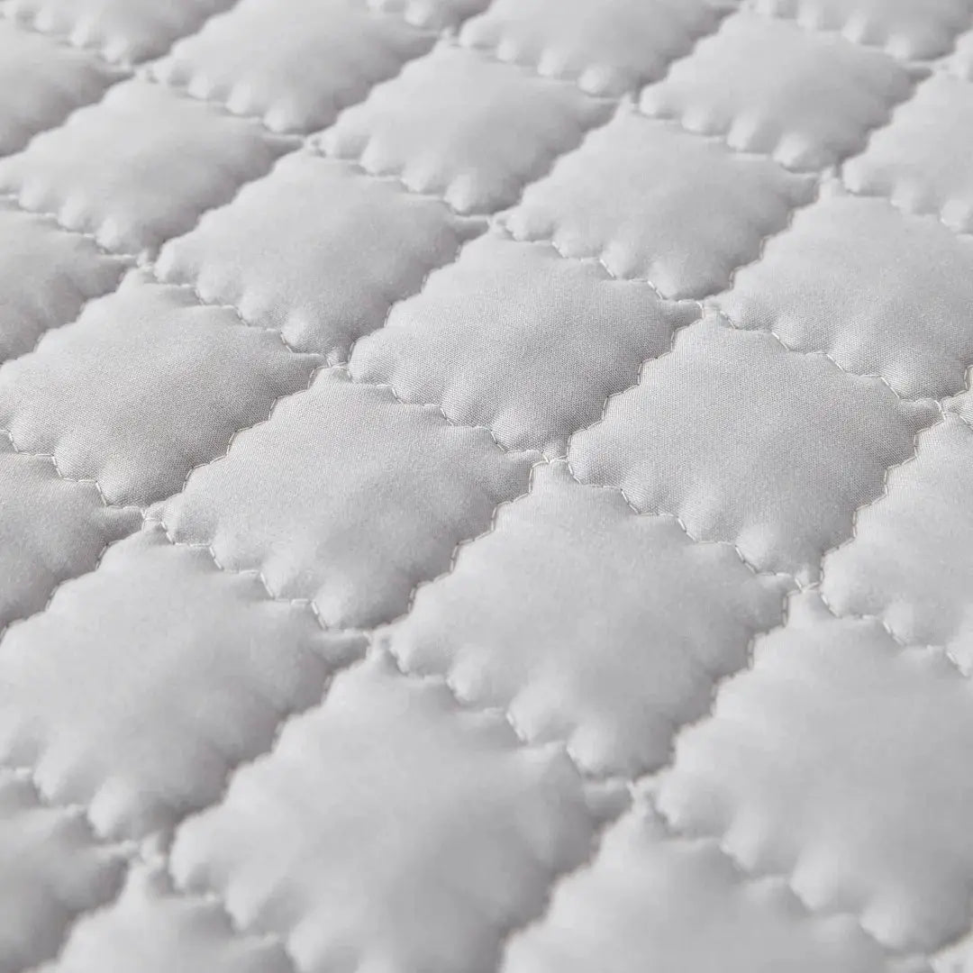 Sofa cover quilted white fabric with square padded pattern