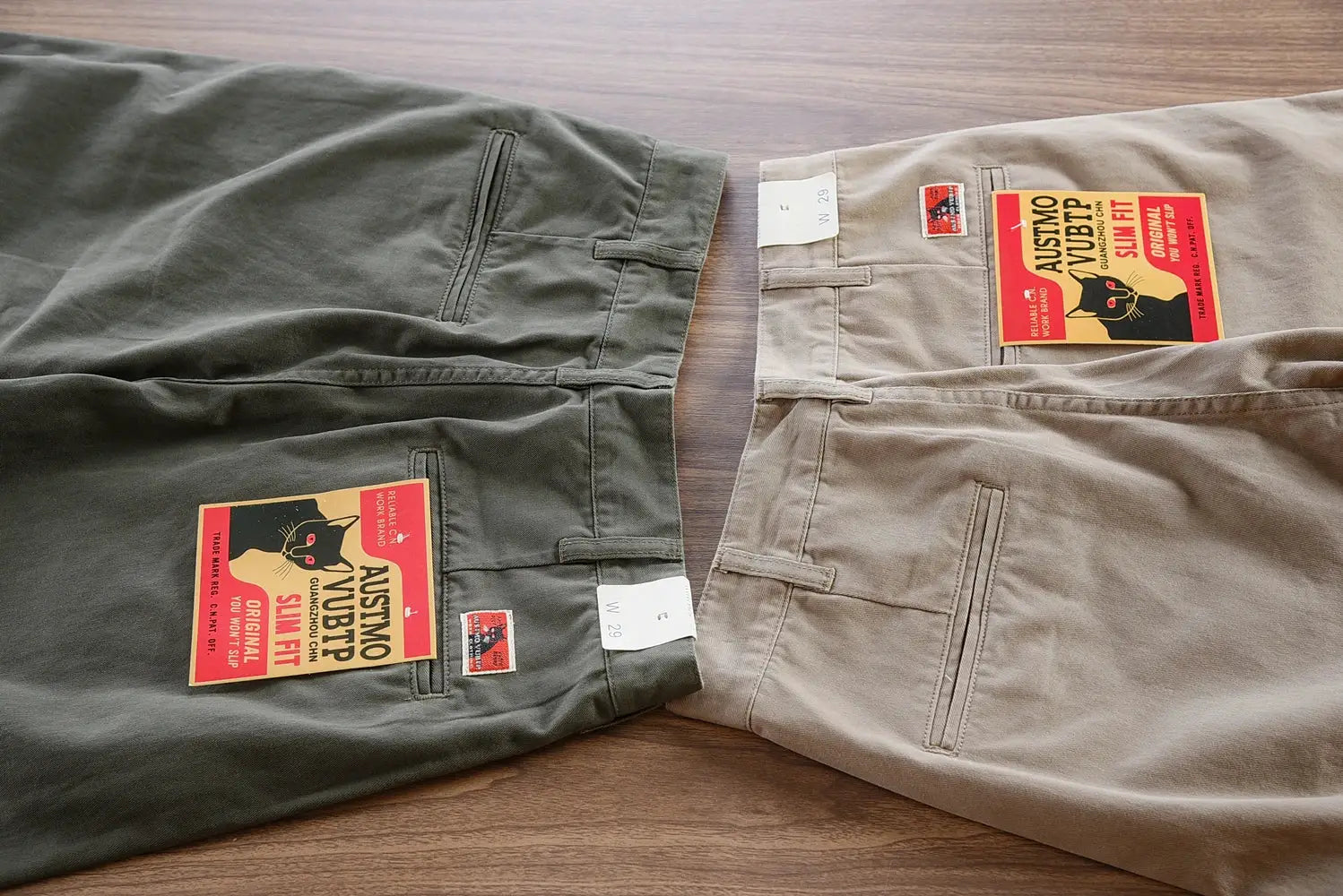 Men's cotton twill driving pants in olive green, beige, and taupe; three pairs shown.