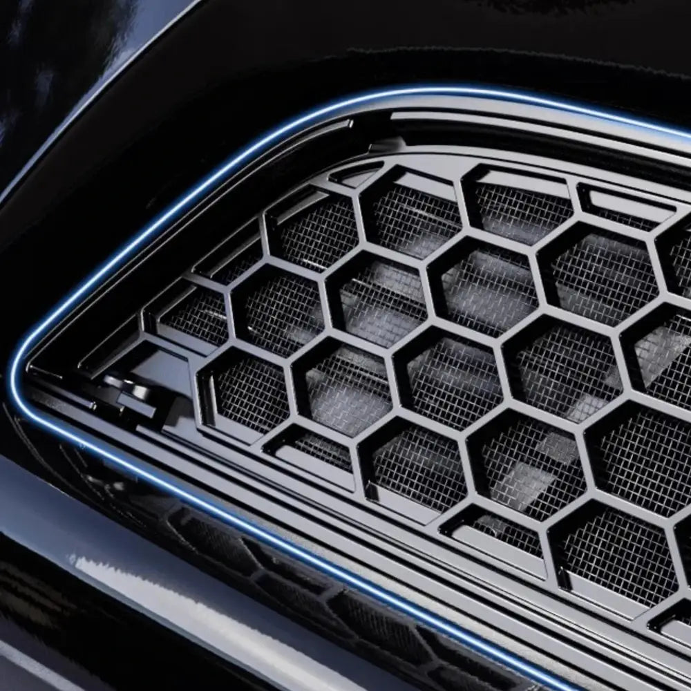Grille mesh inserts for Tesla Model Y and Model 3 front bumper, hex honeycomb black grille with blue trim.