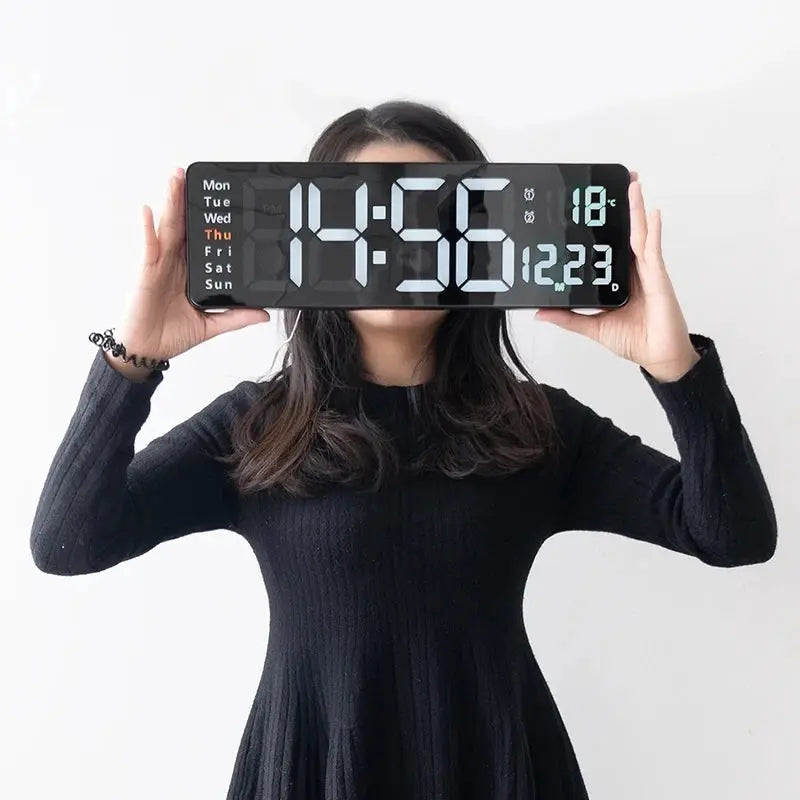 Large black digital LED wall clock with week display, date and temperature readouts