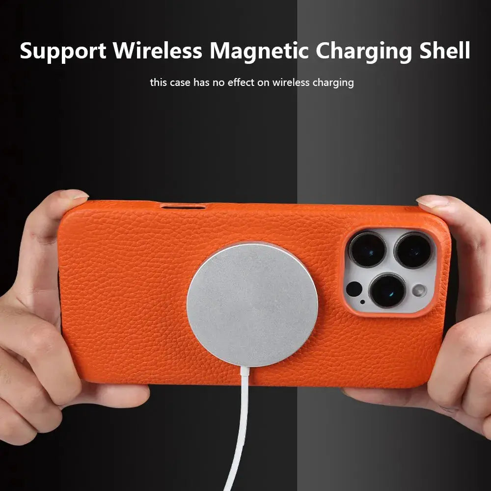 Leather MagSafe phone case orange by Simples Market with circular charger attached