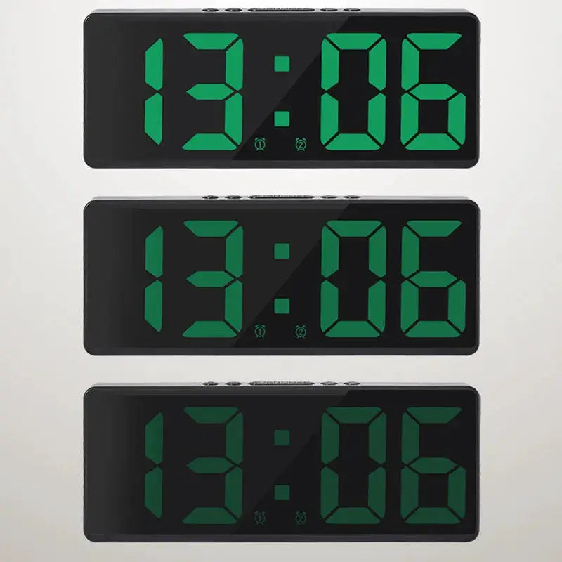 Acrylic mirror digital alarm clock with green LED digits; three clocks shown