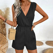 Romper jumpsuit, women's black sleeveless with cross V-neck and elastic waist