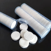 Compressed towels; white non-woven face towels in portable tubes, 20 pcs