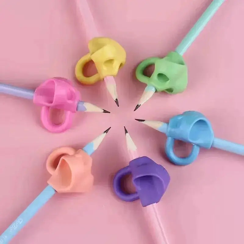 7-piece silicone three-finger pencil grip set in pastel colors for correcting writing posture