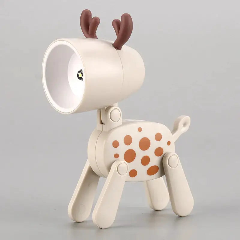 Deer-shaped mini LED night light with cream body, brown spots, antlers, and adjustable head