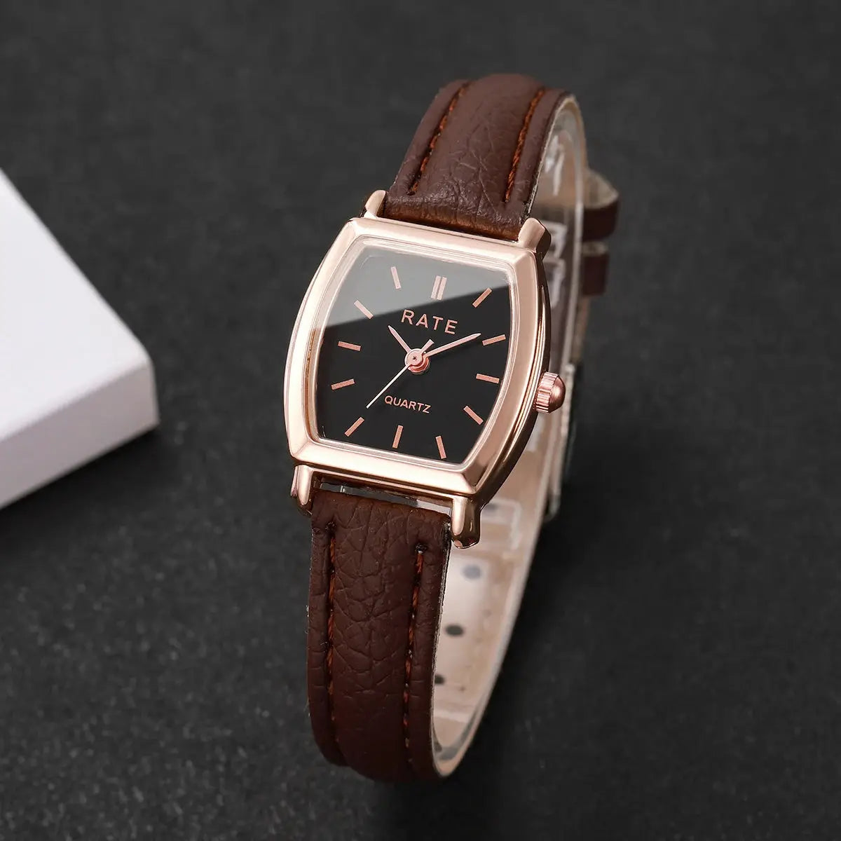 Women's watch with brown leather strap and rose-gold-tone case