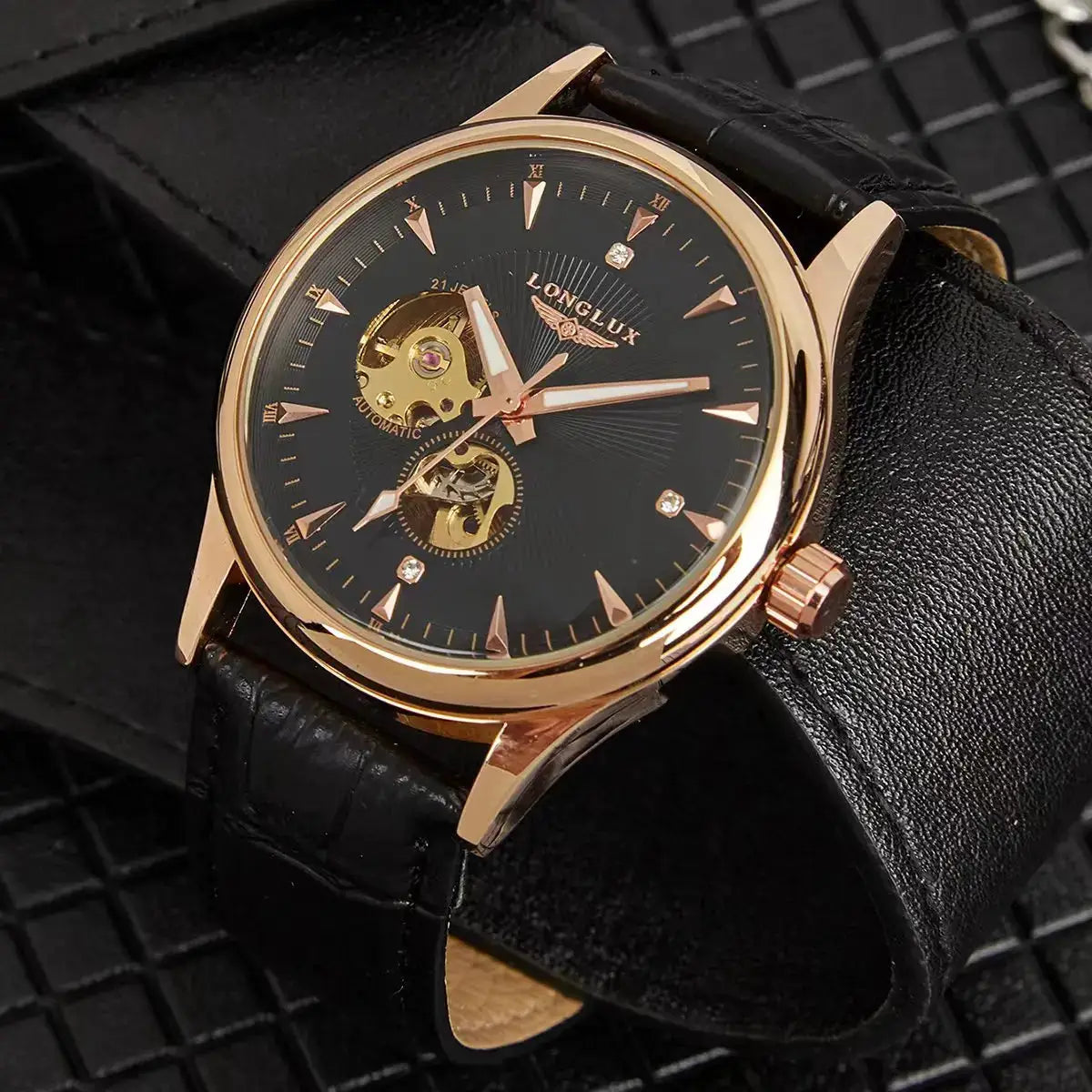 Automatic skeleton watch with gold-tone case, black leather strap, LongLux.