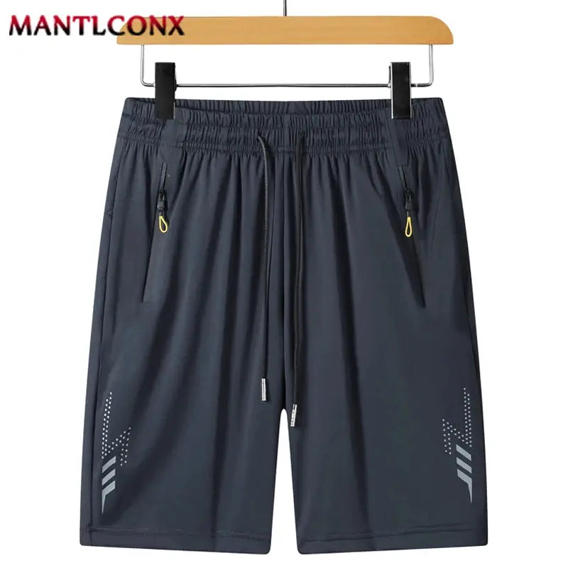 Black men's athletic shorts with elastic drawstring waist, zip pockets, and reflective side accents