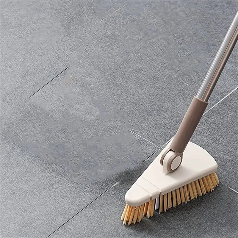 Triangle floor brush with long detachable beige handle for cleaning bathtubs, bathroom floors and gaps