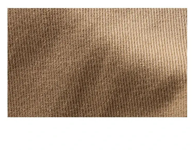 Cargo pants brown khaki fabric texture close-up detail