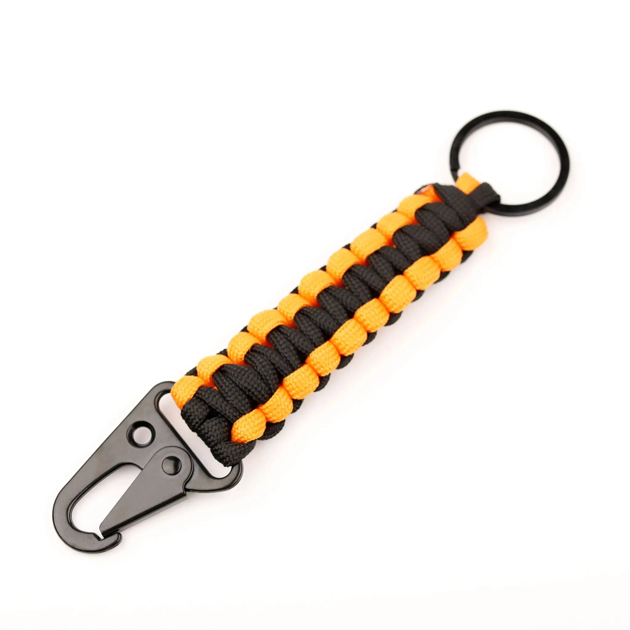 Simples Market paracord keychain with orange and black braided rope and built-in bottle opener.