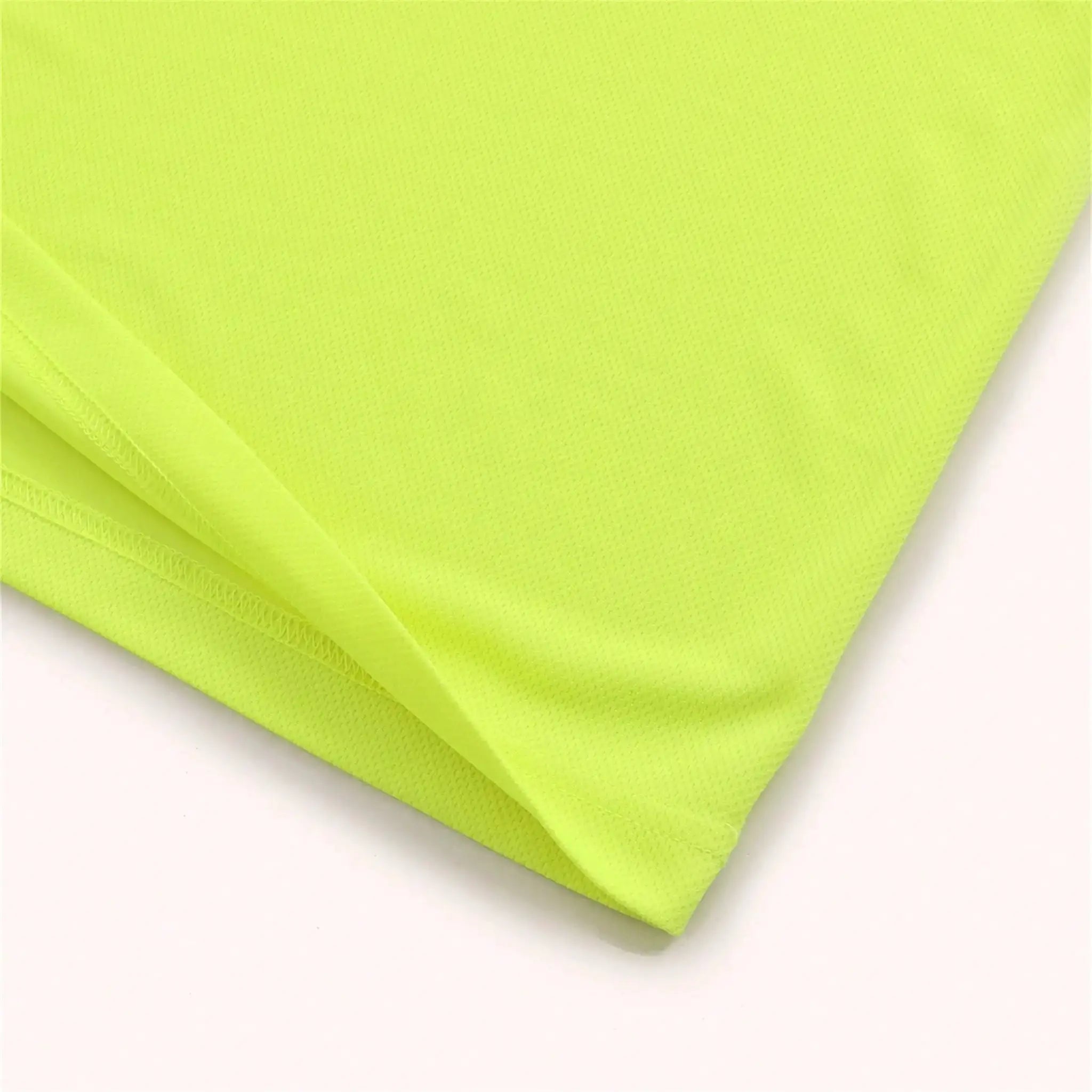 Men's performance long sleeve tee fabric close-up in neon lime green, breathable mesh