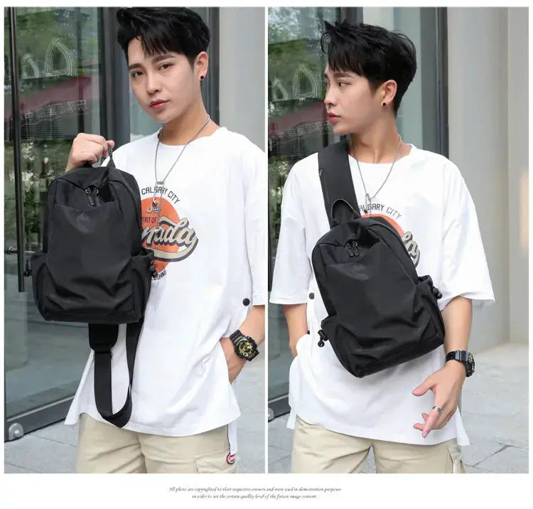 Men's black canvas crossbody chest bag with top handle and adjustable strap
