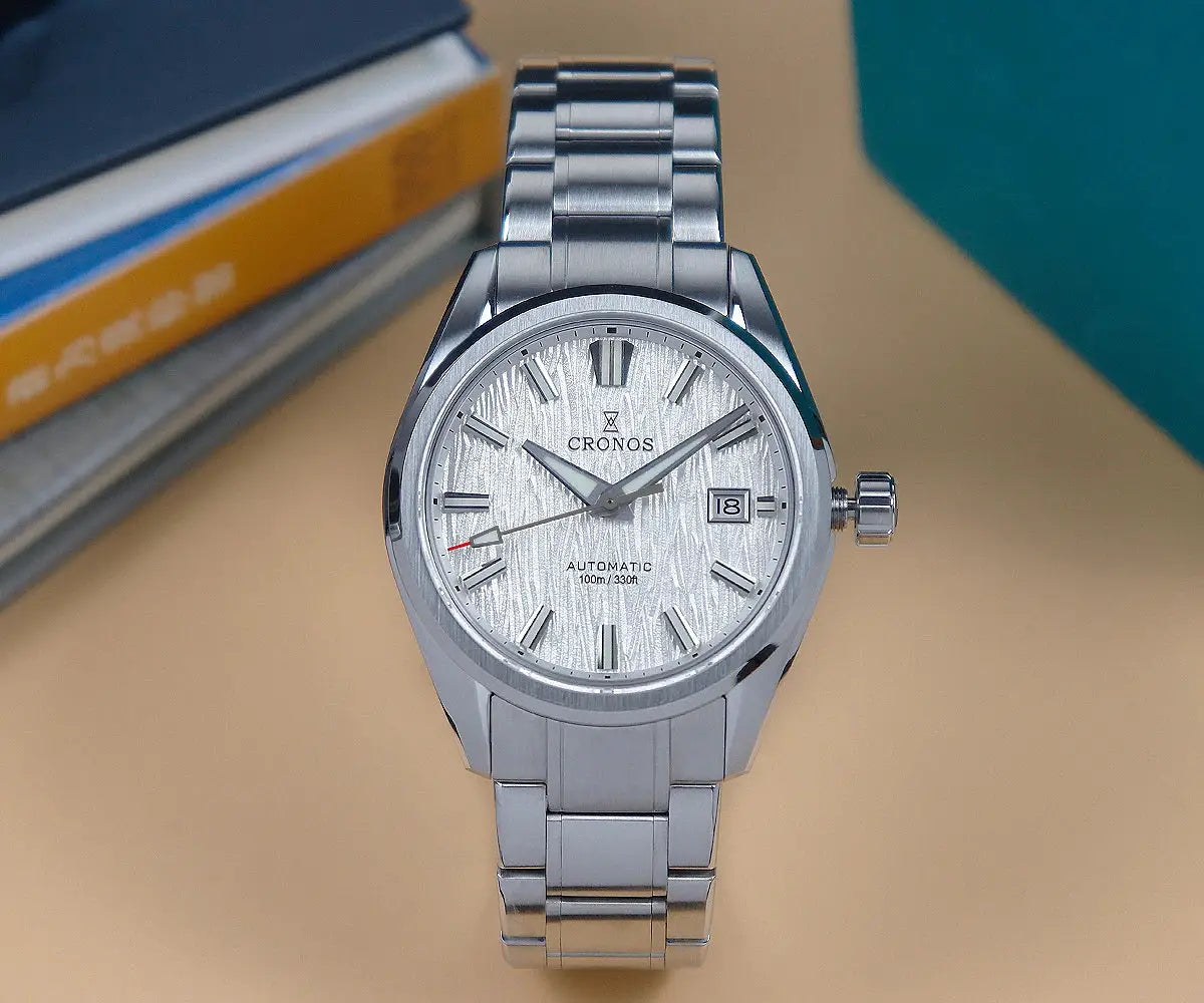 Cronos men's stainless steel watch with white birch-pattern dial, automatic movement, date display