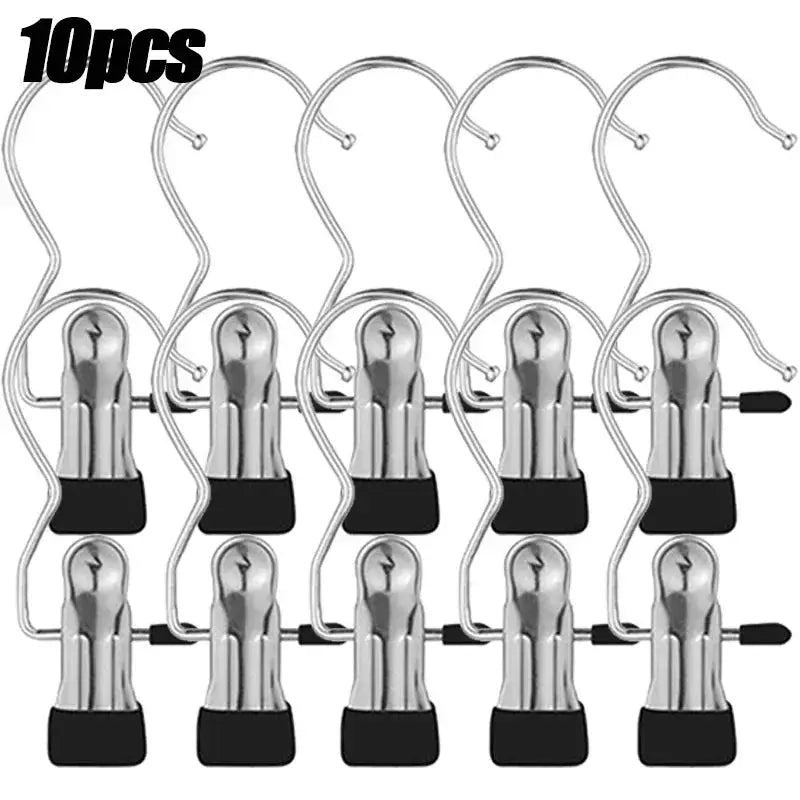 Stainless steel clothespins room organizer set of 10 with black grip ends on a metal extendable clothes rack