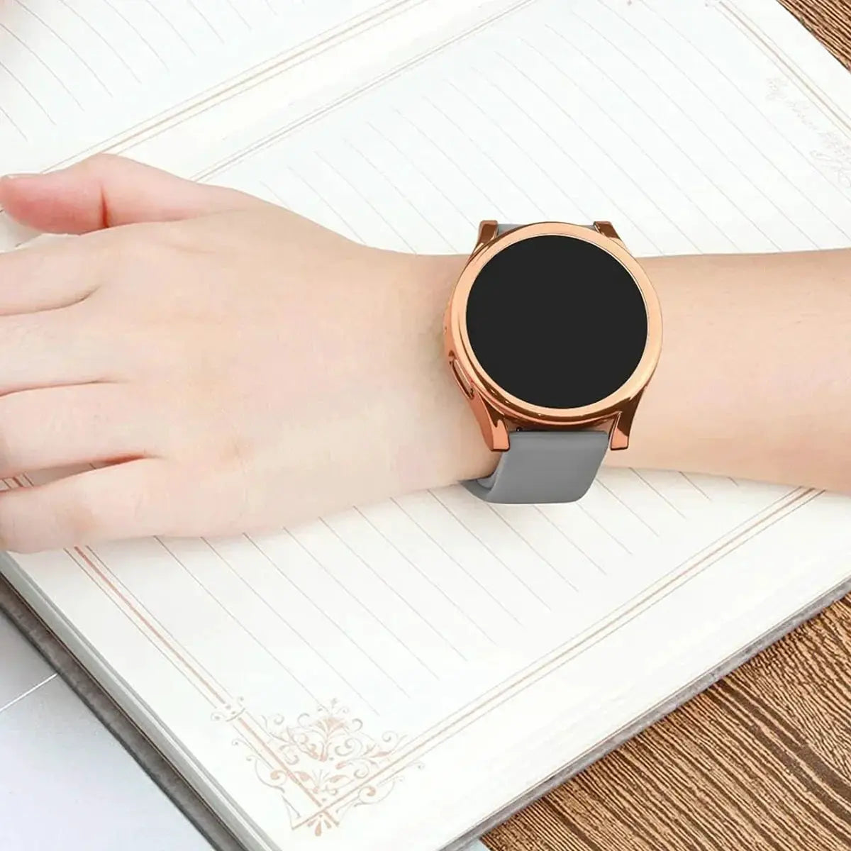 Full-cover TPU case for Samsung Galaxy Watch 7/6/5/4/FE with rose-gold bumper and gray strap