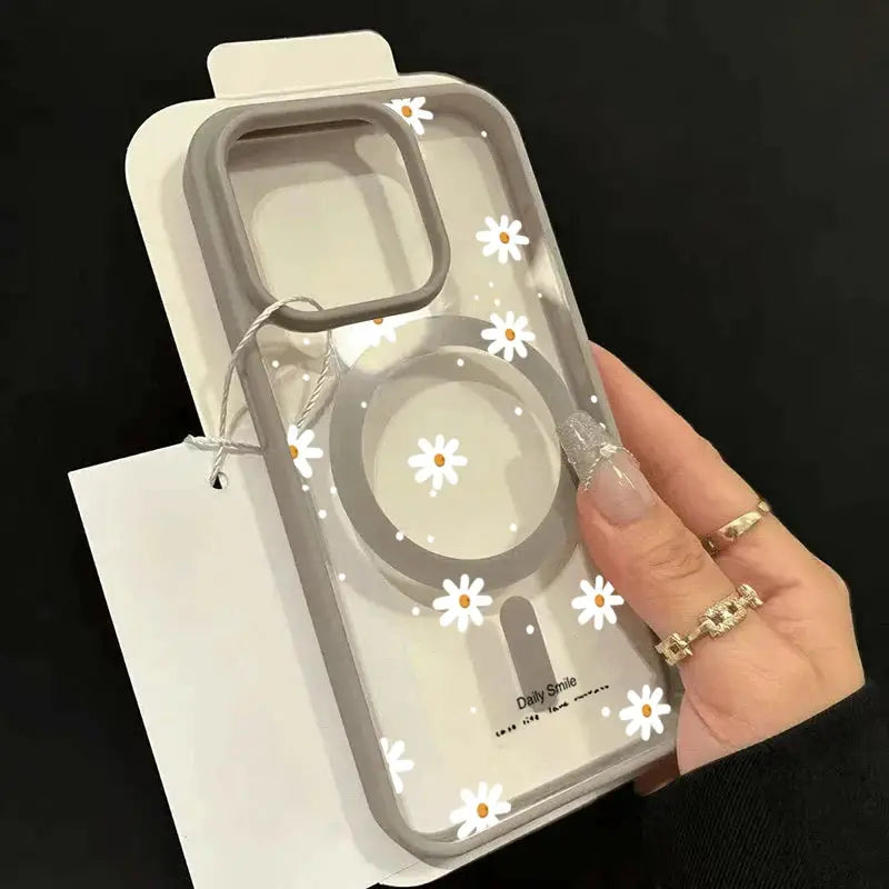 Simples Market iPhone case with daisy pattern, clear back, gray bumper, magnetic ring for wireless charging