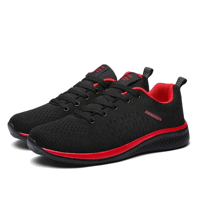 Pair of knit running shoes, black with red lining and sole stripe, breathable lightweight sneakers