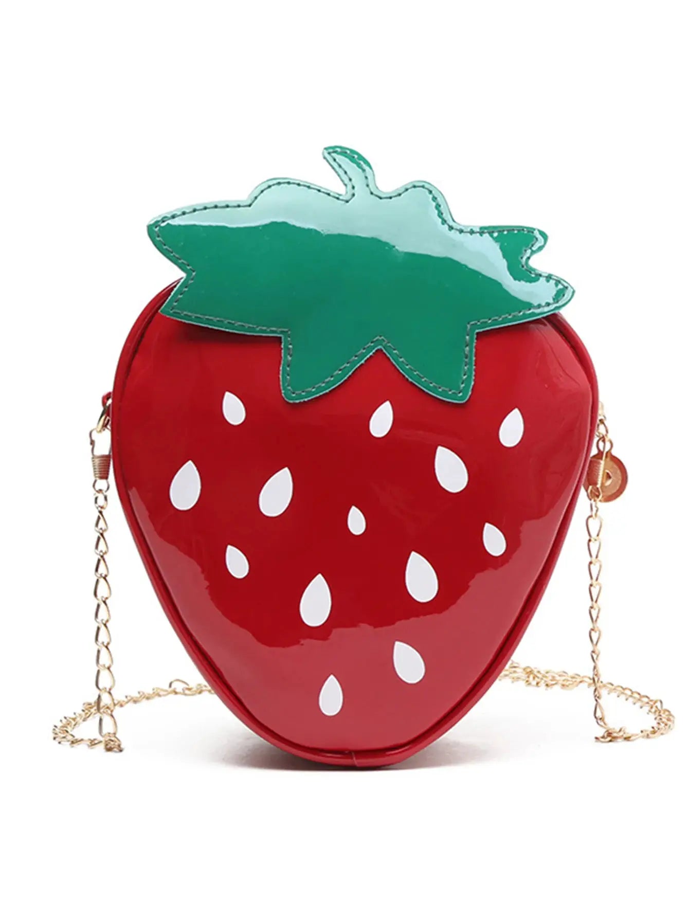Strawberry-themed crossbody bag in glossy red with white seeds, green leaf top, and gold chain strap.
