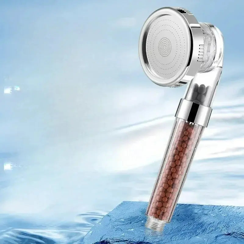 Simples Market handheld rainfall shower head with anion filter, chrome finish and bead-filled transparent tube.