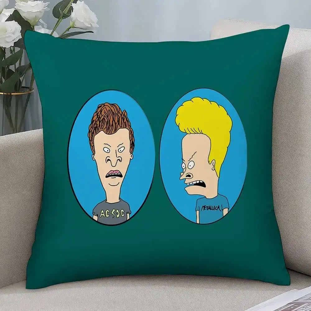 Beavis and Butt-Head pillow cover; green square plush with double-sided print of two cartoon heads in blue ovals