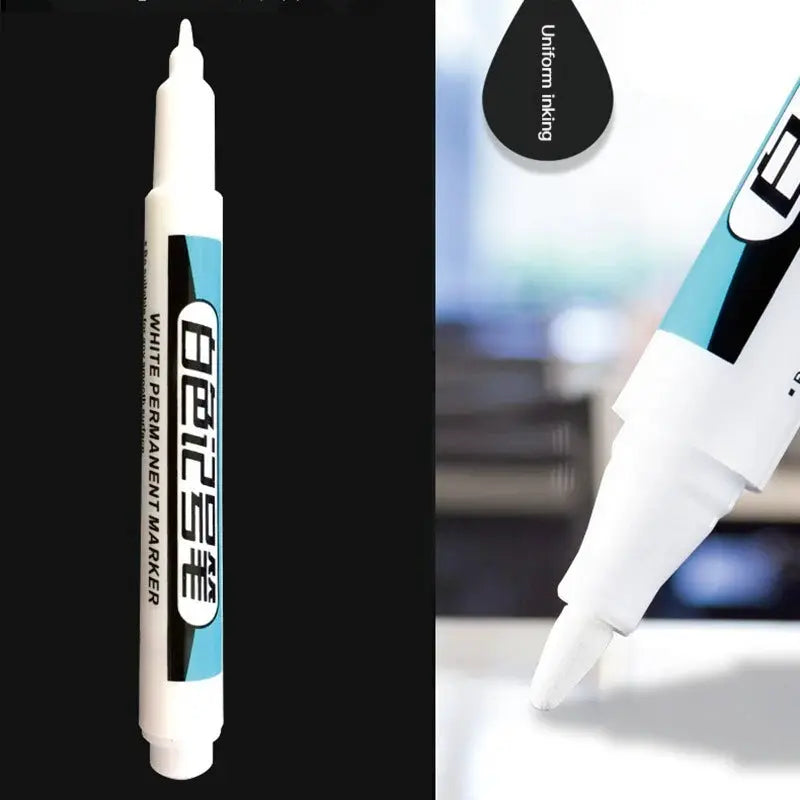 White permanent paint pen set with blue label, 0.7mm tip for multi-surface use