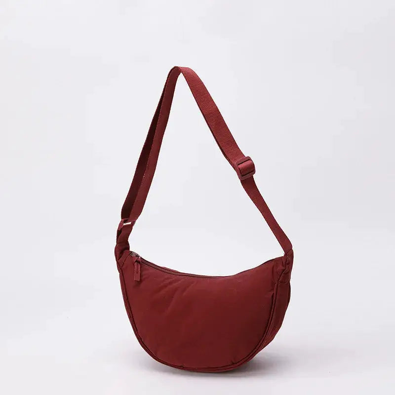 Nylon fabric zipper crossbody bag, burgundy crescent dumpling style with adjustable strap, large capacity.