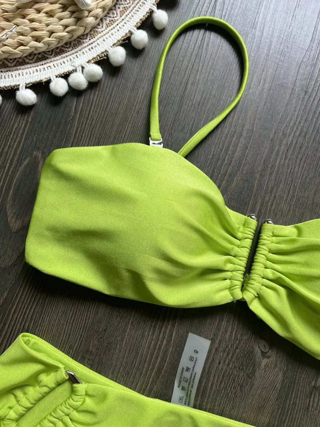 Lime green bandeau bikini set with ruched sides; two-piece swimsuit