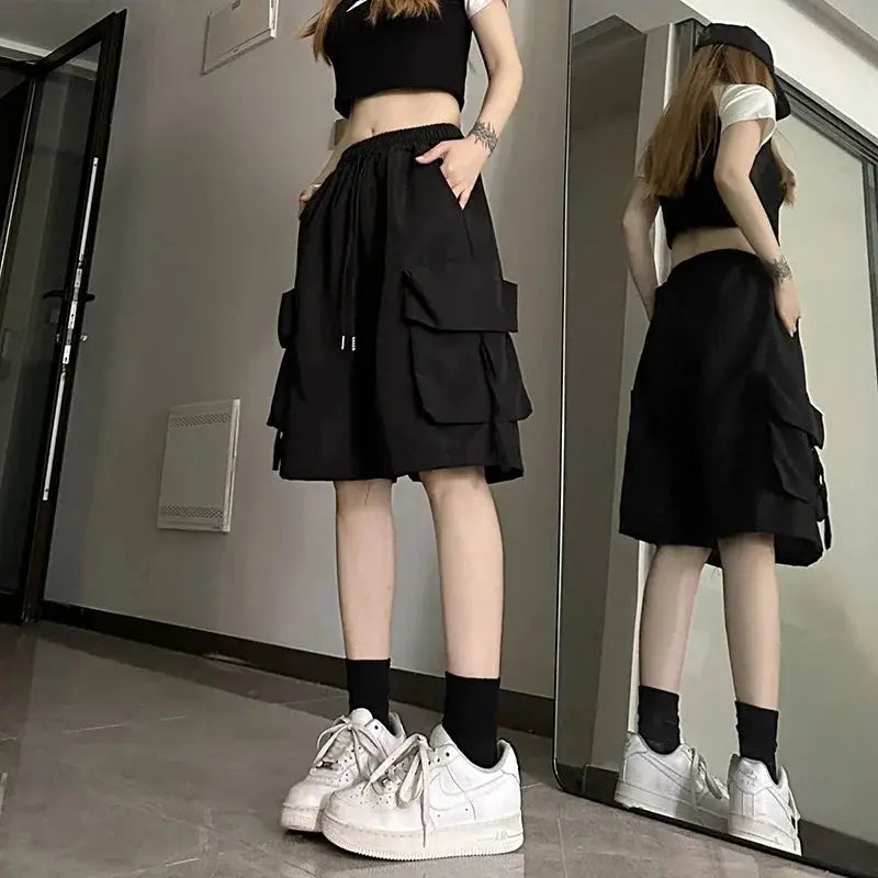 ZOKI women's black high-waist cargo shorts with large pockets, wide-leg streetwear by Simples Market