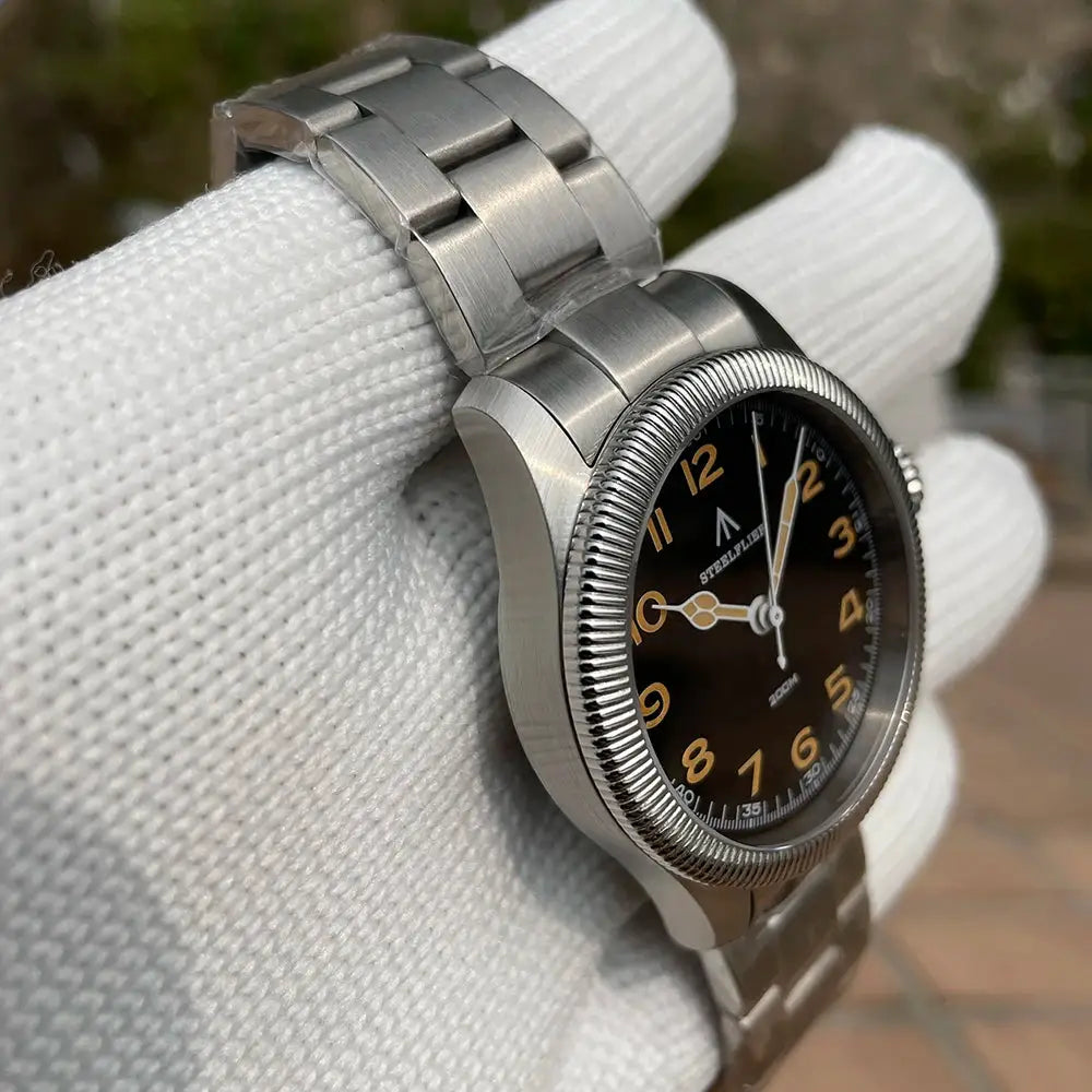 Steelflier SF741 wristwatch on stainless steel bracelet with black dial and orange luminous numerals