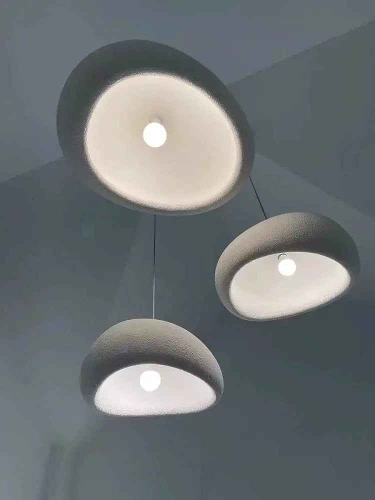 Nordic Wabi Sabi pendant lights by Simples Market, set of 3 modern LED ceiling chandeliers with matte gray domes.