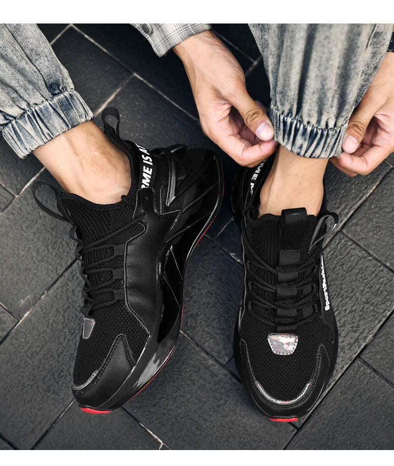 Pair of men's black sneakers with red accents by Simples Market, breathable mesh athletic trainer