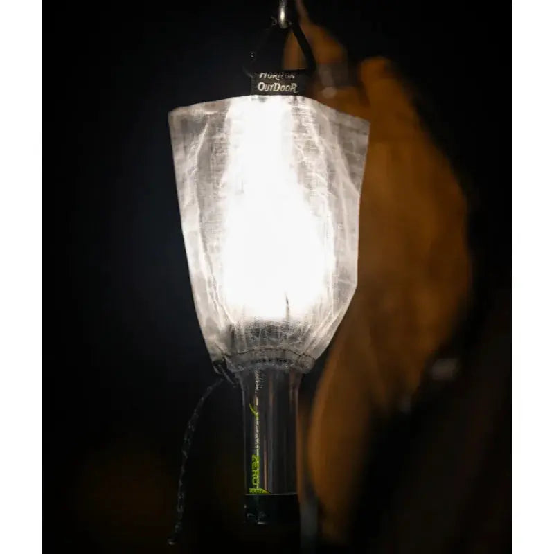 Stashlite lantern diffuser in translucent Dyneema DCF stuff sack for ultralight camping