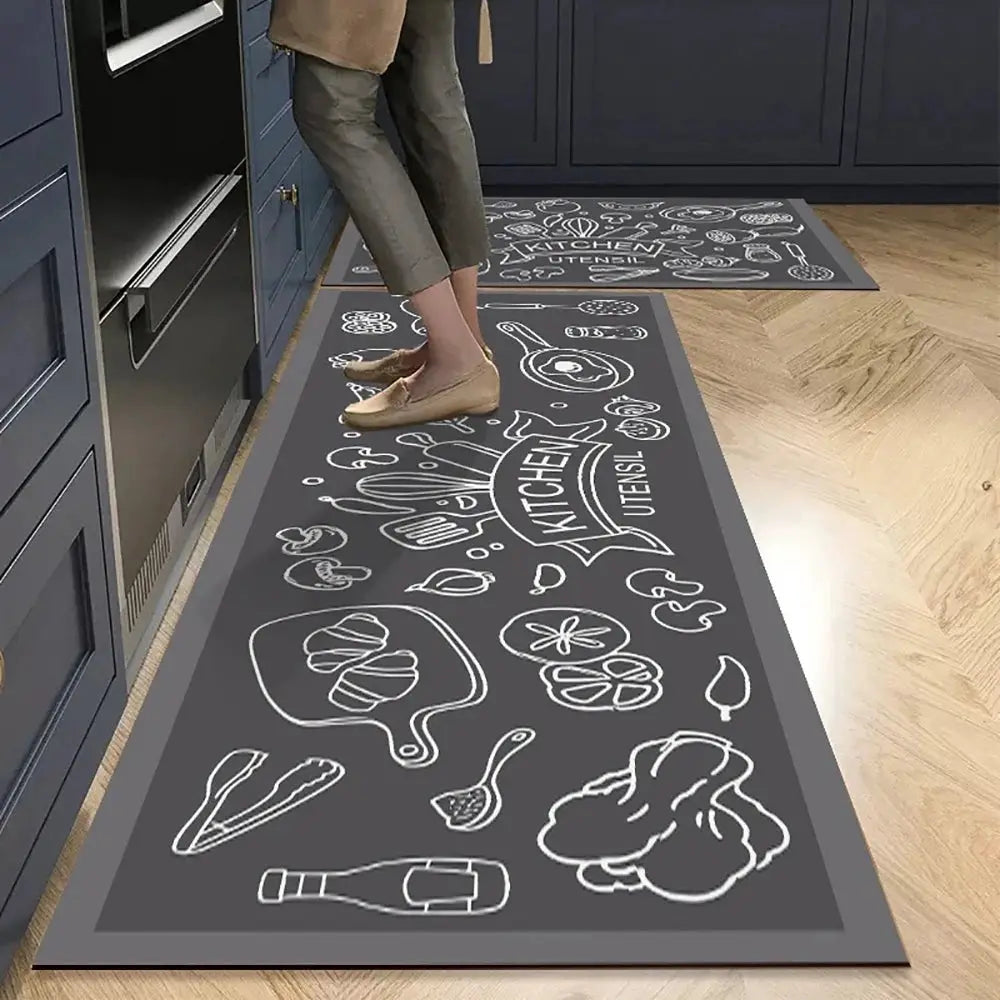 Two gray non-slip kitchen mats with white chalk-drawn food icons on crystal velvet finish