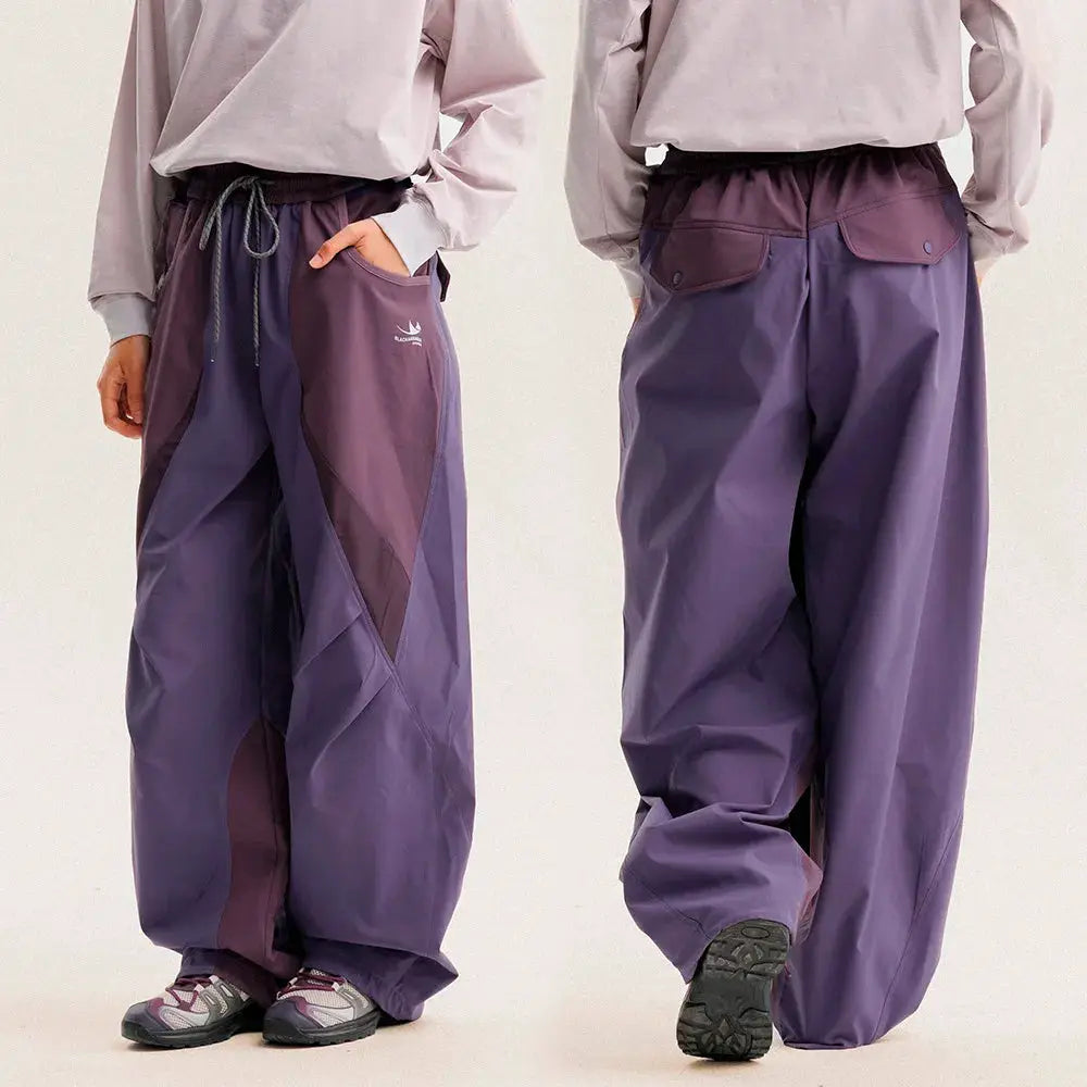 Outdoor quick-dry wide-leg cargo pants by Simples Market, purple with panel accents, baggy fit.