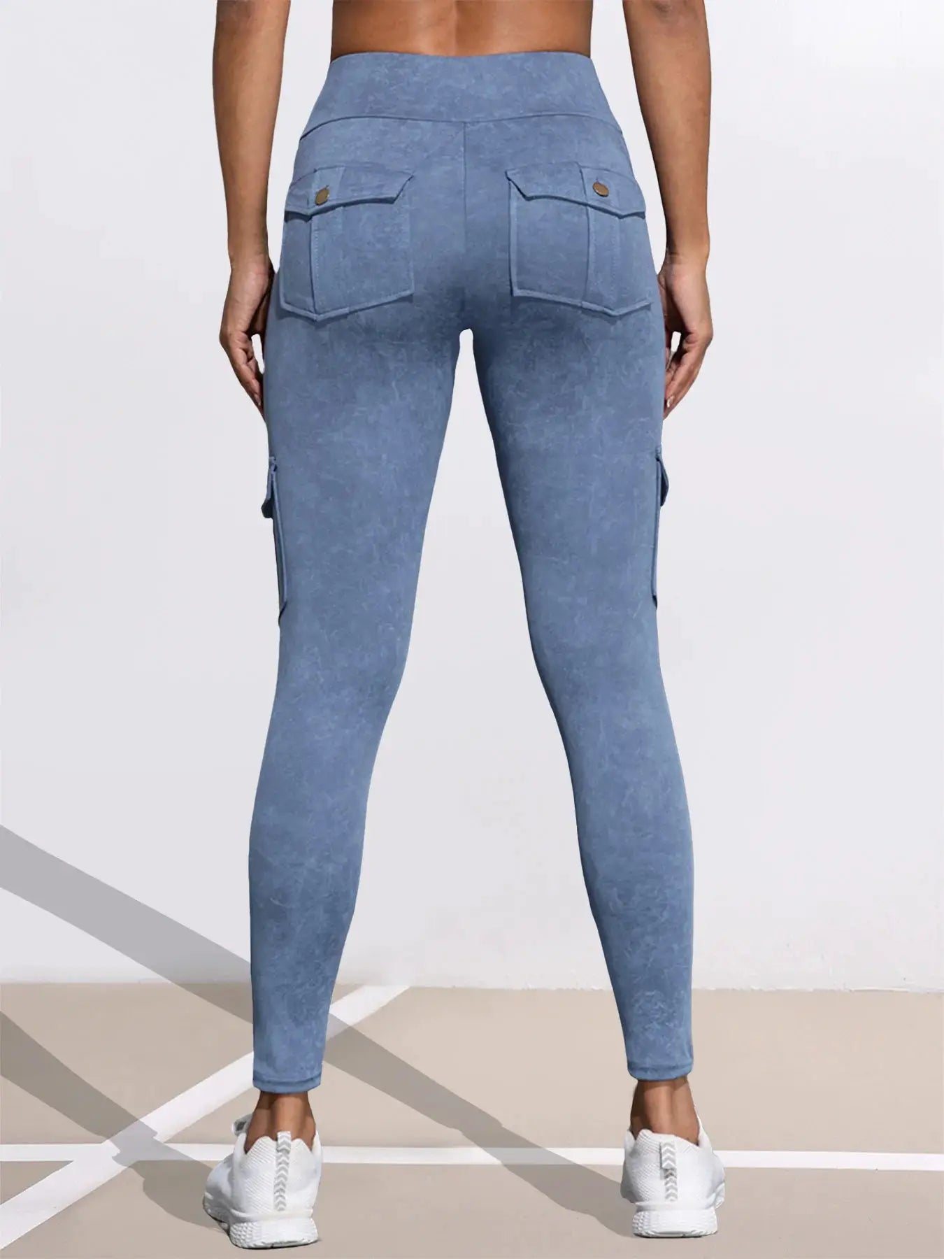 Women’s blue washed-print leggings with back flap pockets and side cargo pockets, high-waisted butt-lifting athletic tights.