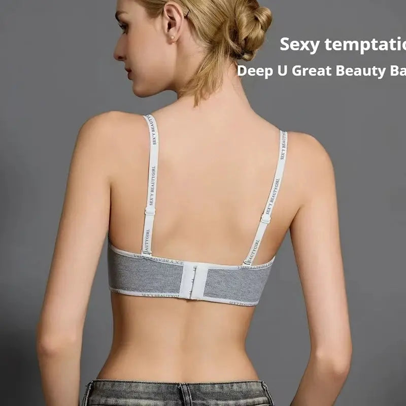 Women's seamless push-up bra back view with white adjustable straps and gray band