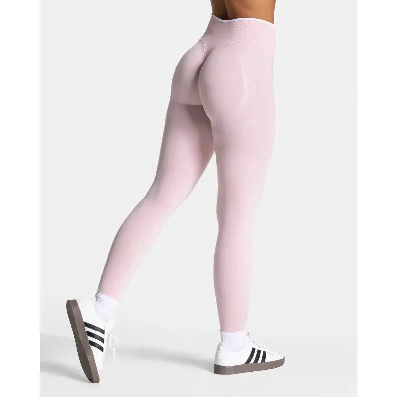 Pink seamless knitted high-waist yoga leggings for women, hip-lifting gym workout wear