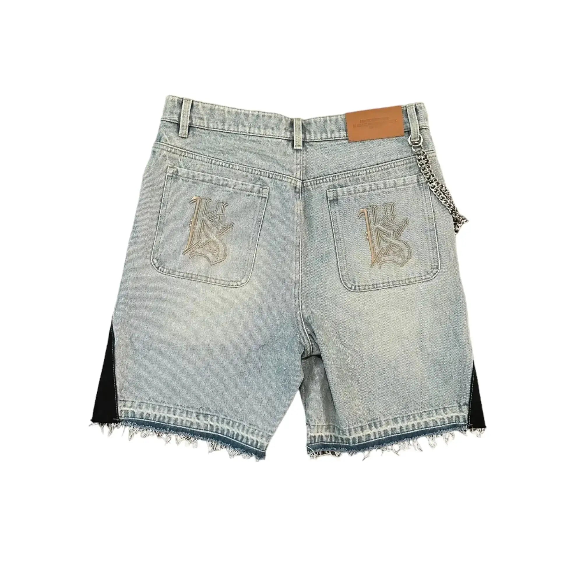 Denim shorts with retro blue wash, embroidered back pockets, leather patch, frayed hems, and chain detail