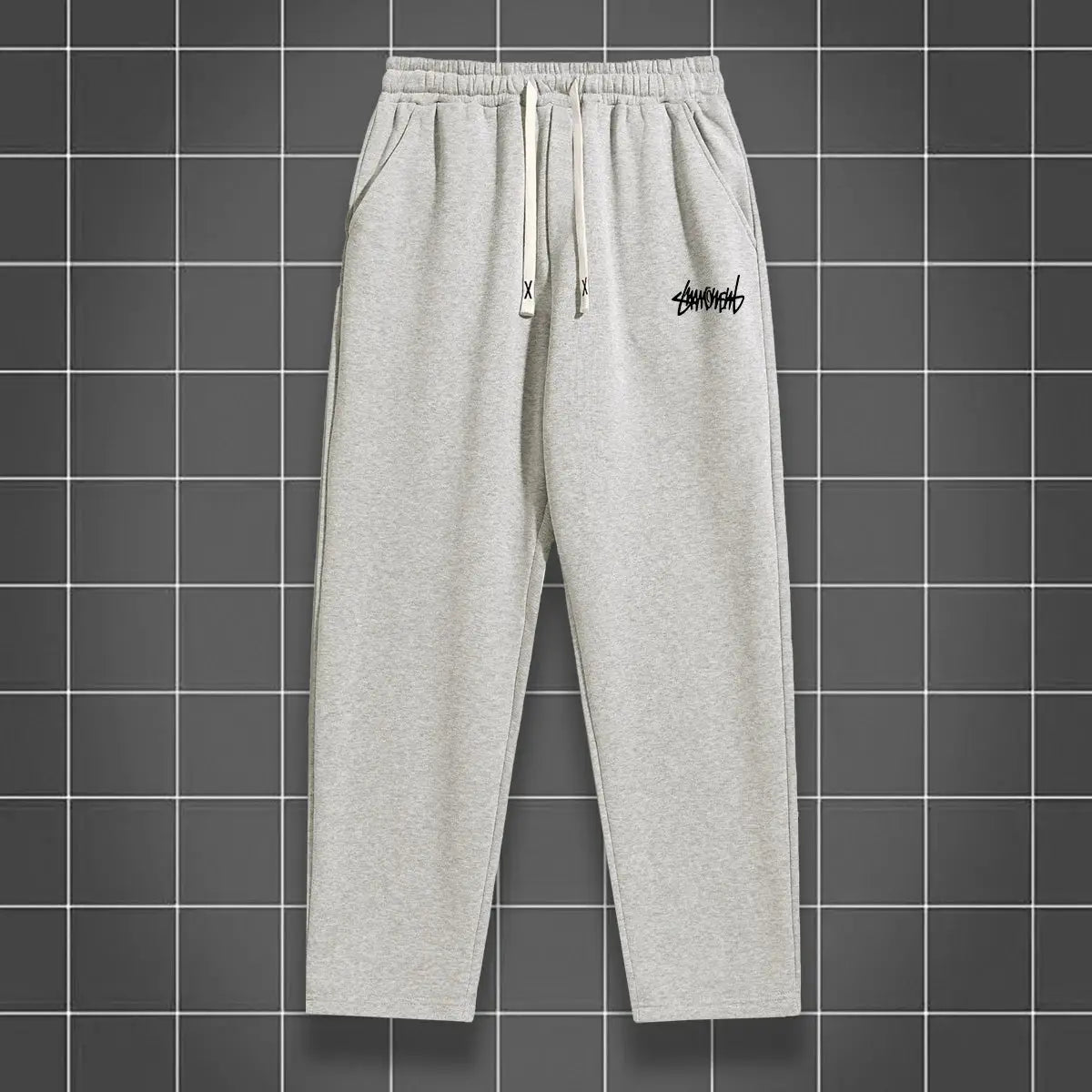 Men's grey solid-color jogging pants, straight-leg with drawstring waist and side pockets