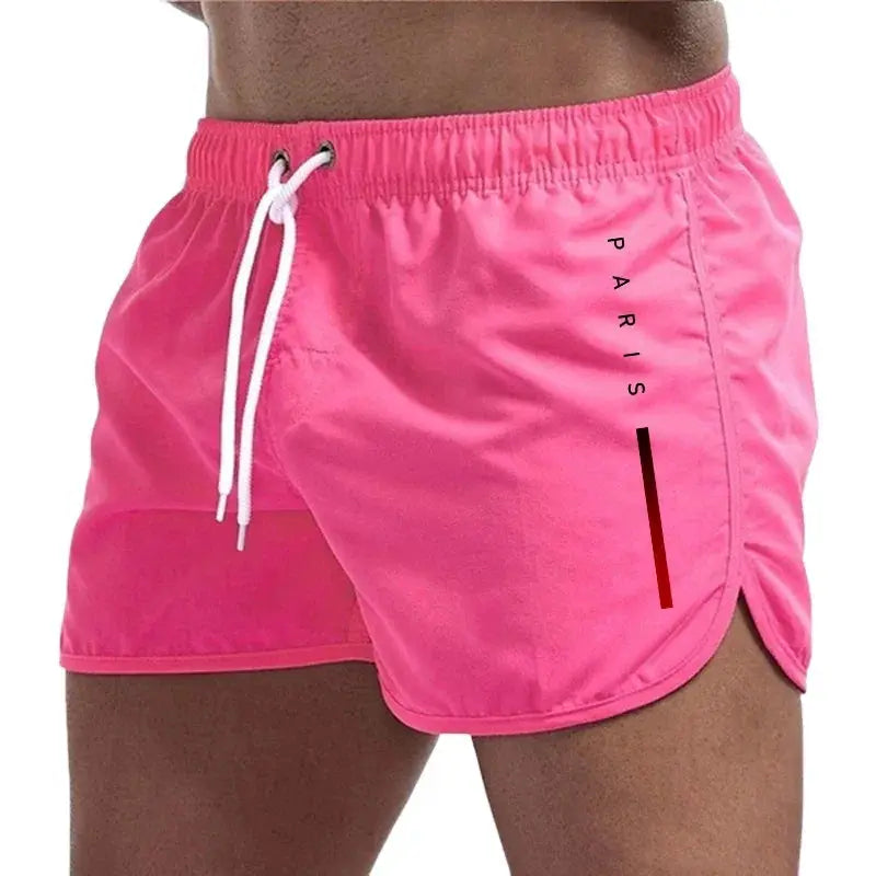 Pink men's board shorts with white drawstring and Paris vertical print, casual beach and gym wear